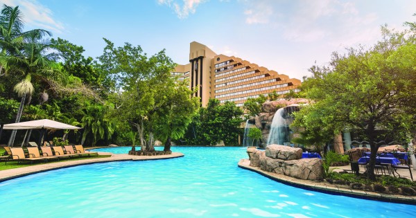 Tourism in Sun City, north west province https://www.suninternational.com/content/dam/suninternational/sun-city-resort/cascades/pool/SCR2h0001-signature-cascades-pool-exterior-day.jpg.sunimage.600.315.jpg?utm_source=chatgpt.com