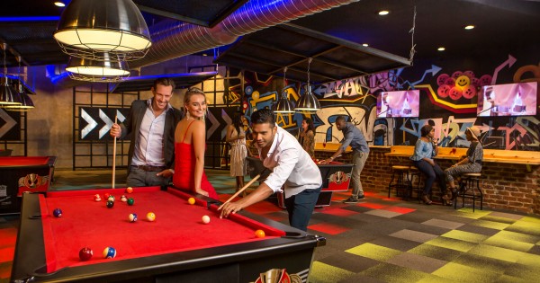 Tourism in Sun City, north west province https://www.suninternational.com/content/dam/suninternational/sun-city-resort/sun-city-hotel/entertainment/vibes/SCR3l3151-sun-city-soho-vibes-playing-pool-XS_5529-1.jpg.sunimage.600.315.jpg?utm_source=chatgpt.com